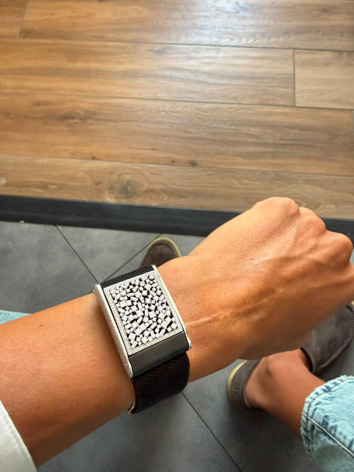 Mixed-cut stone WHOOP accessory on a black band