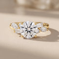 Yellow Gold Round Moissanite Engagement Ring with Mixed Side Stones