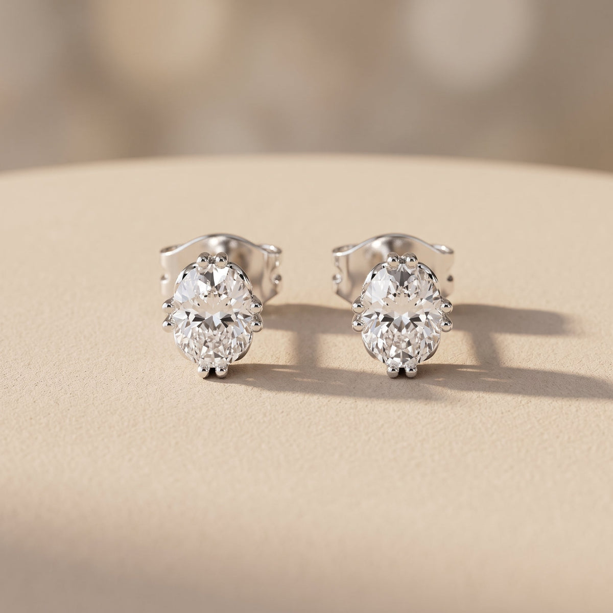 White Metal Oval Cut Moissanite Stud Earrings