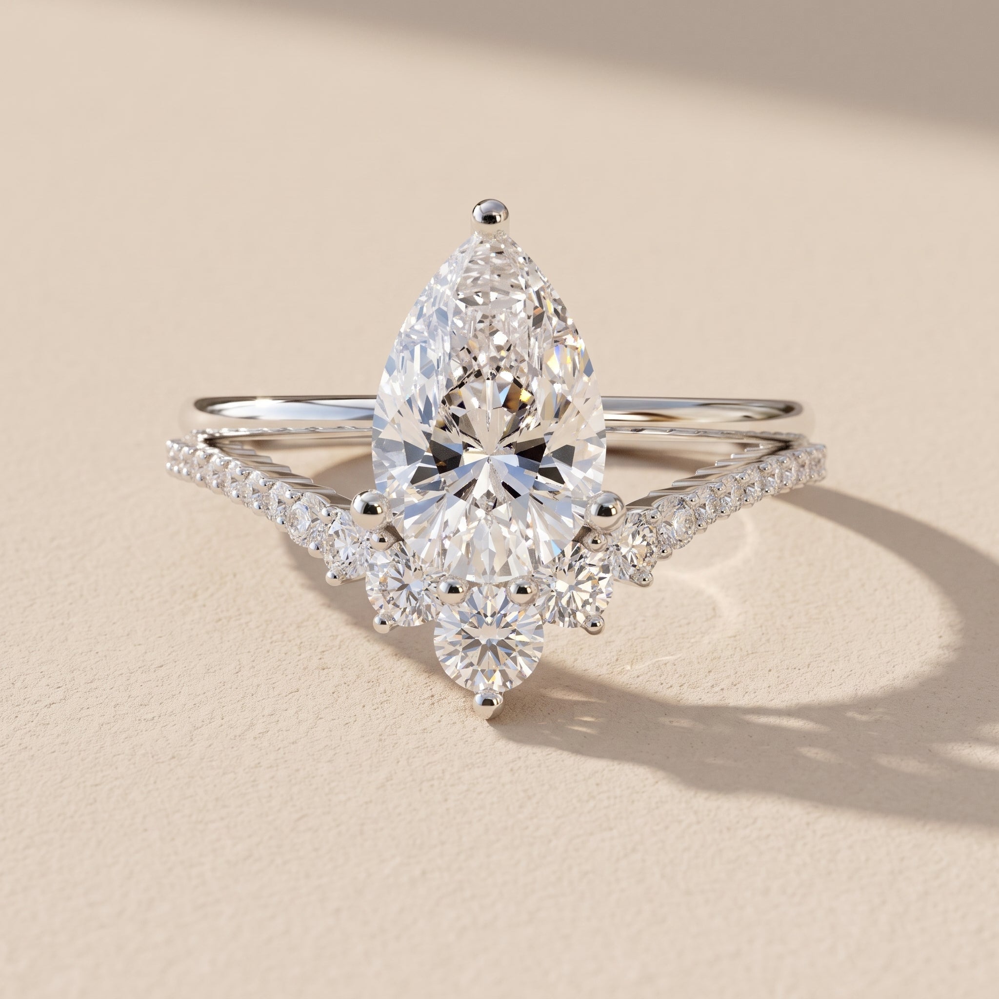 White Pear Cut Moissanite Engagement Ring with Accent Stones