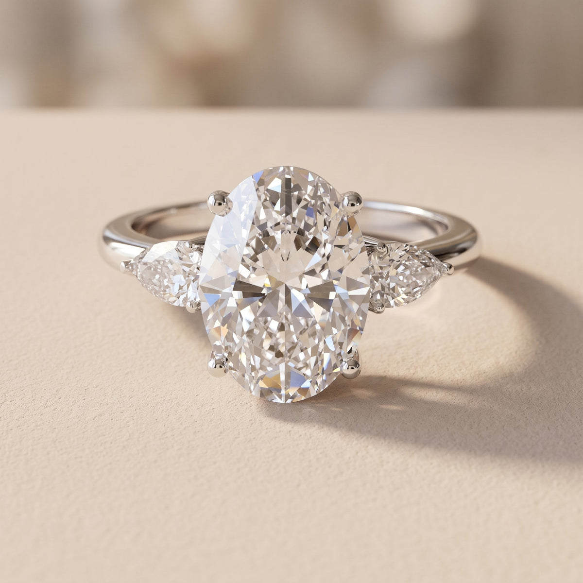 White Gold Oval Moissanite Three-Stone Engagement Ring