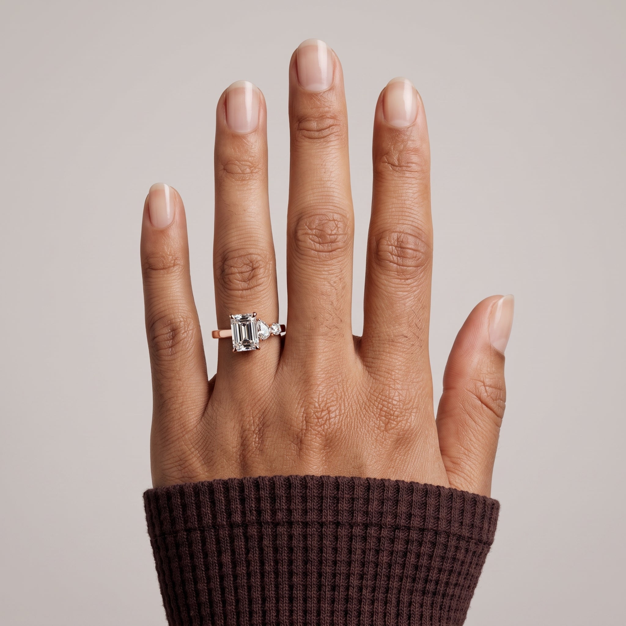 Rose Gold Emerald Cut Moissanite Three Stone Engagement Ring