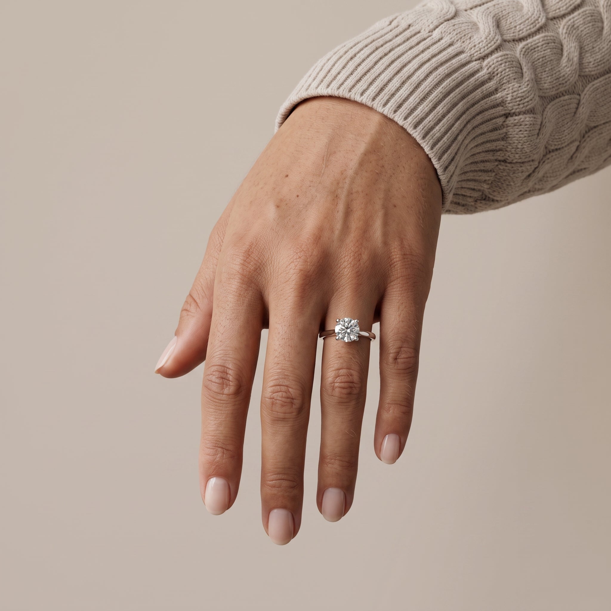 White Metal Round Cut Moissanite Solitaire Ring