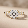 Yellow Gold Round Moissanite Engagement Ring with Side Stones