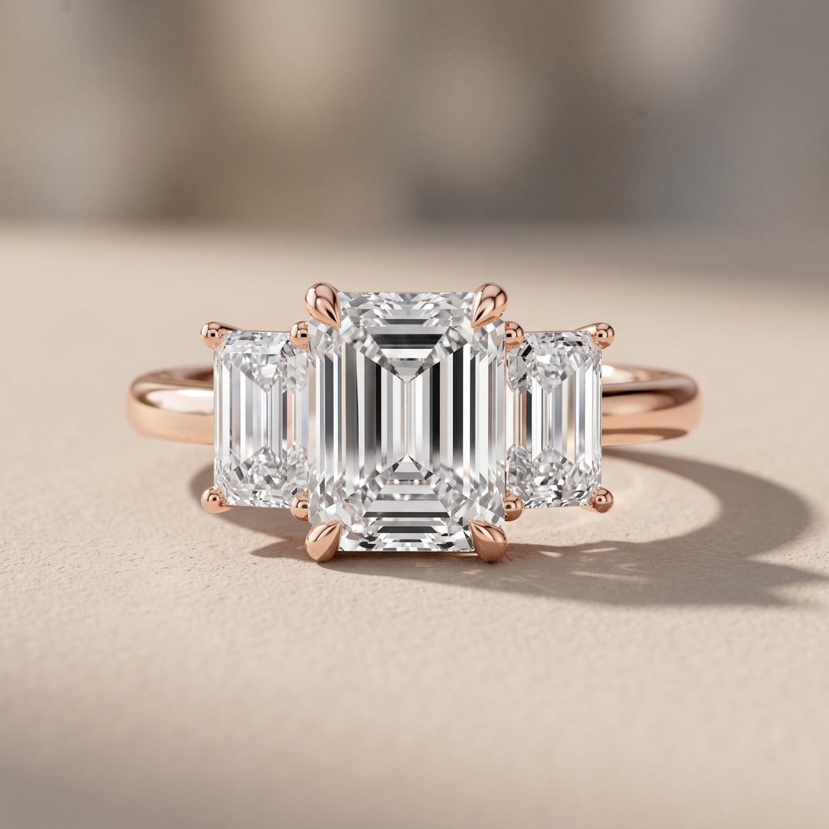 Rose Gold Emerald Cut Moissanite Three Stone Engagement Ring