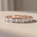 Rose Gold Alternating Oval & Emerald Cut Moissanite Eternity Band