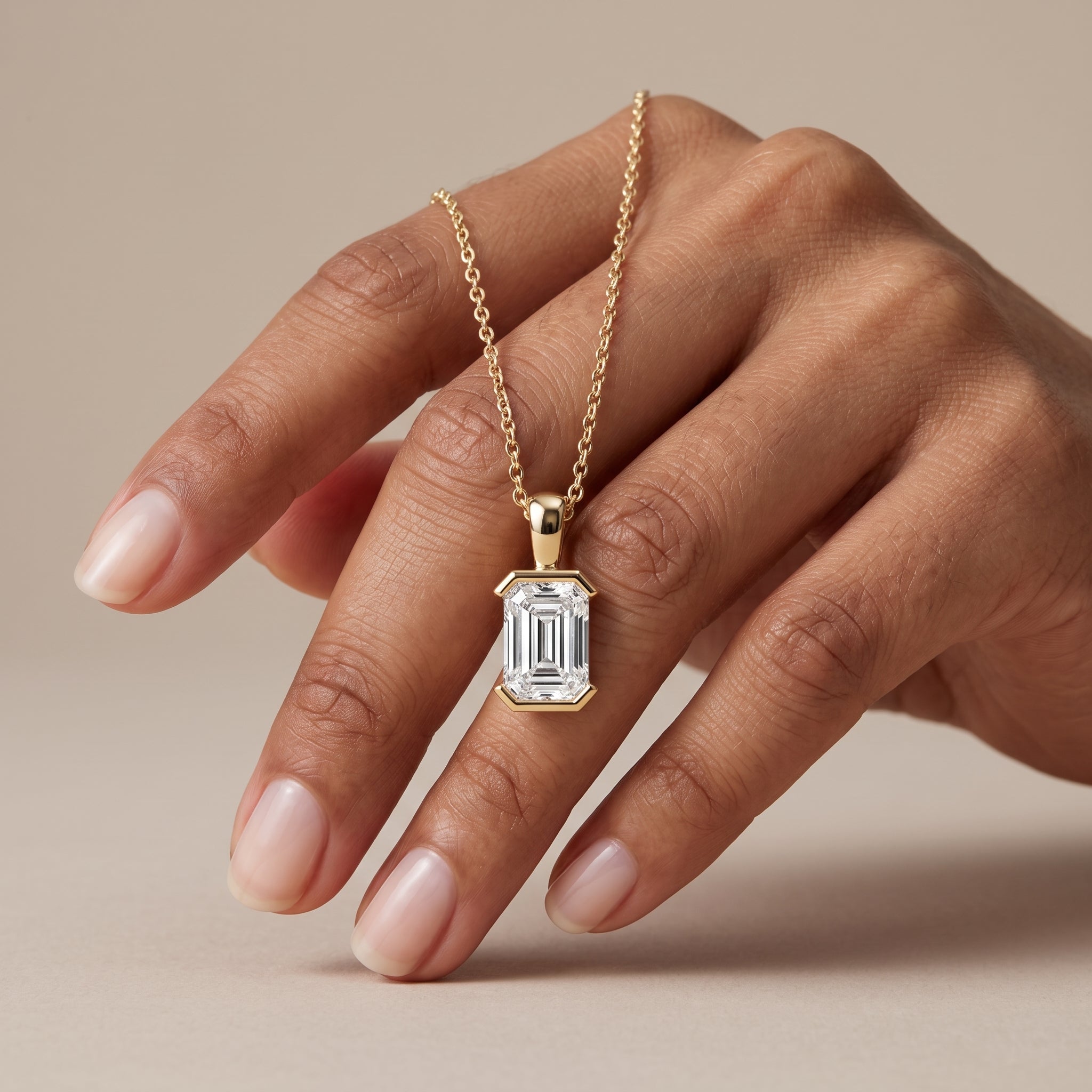 Yellow Gold Emerald Cut Moissanite Pendant Necklace