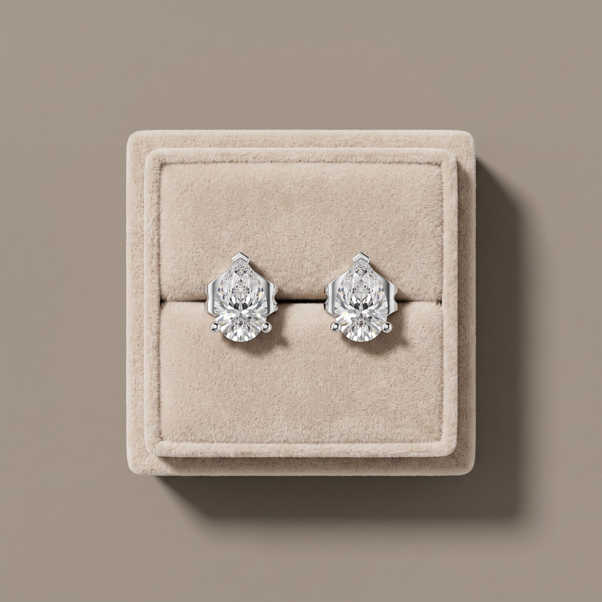 White Pear Cut Moissanite Stud Earrings