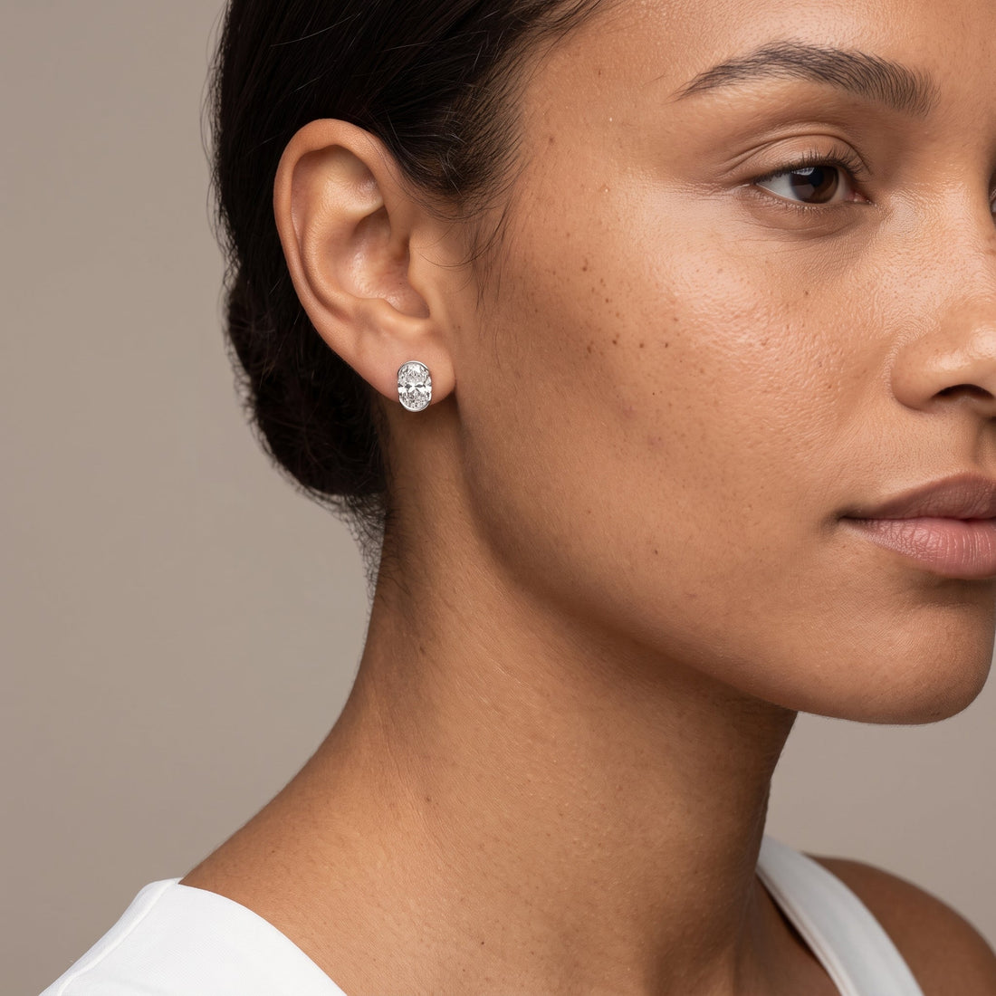White Metal Oval Cut Stud Earrings