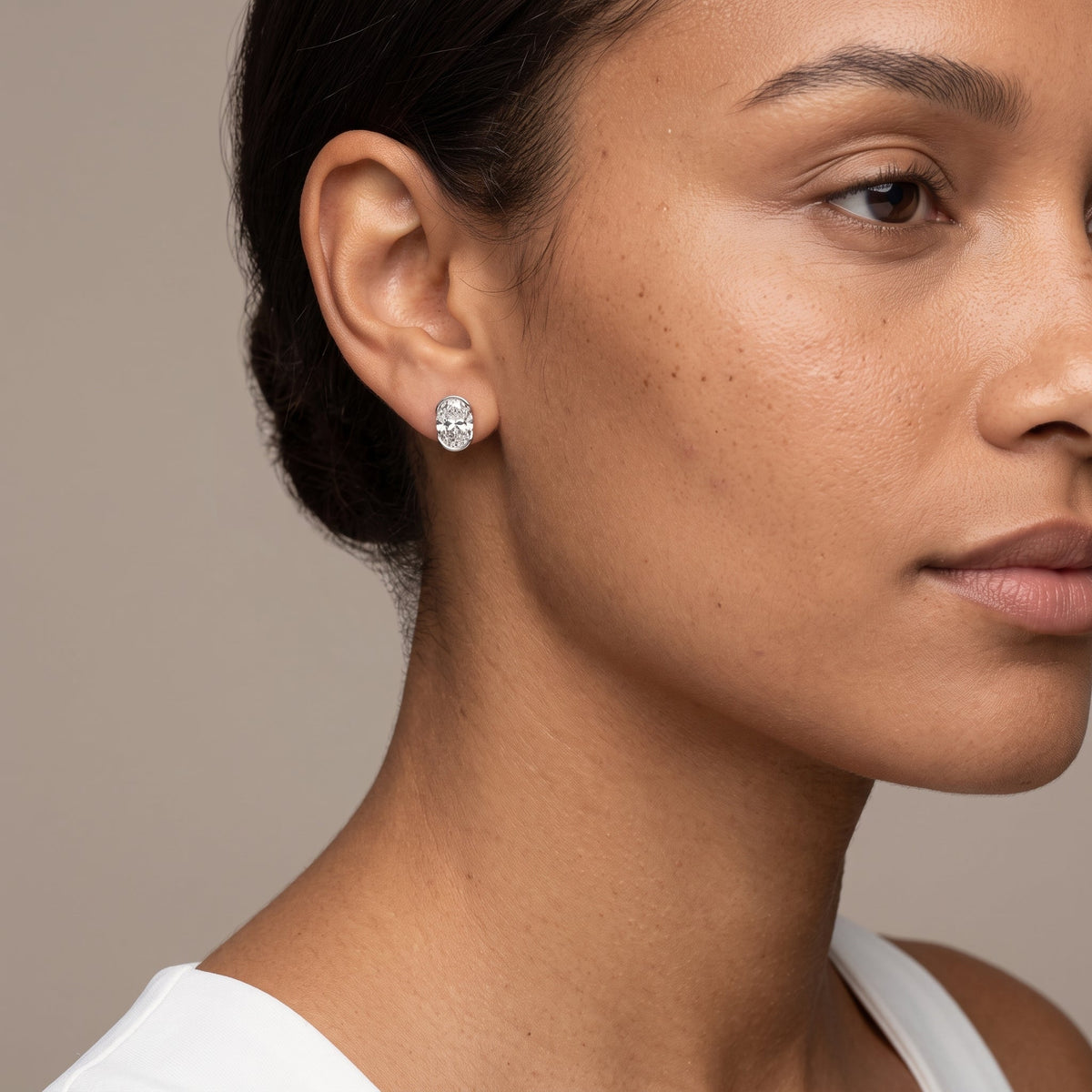 White Metal Oval Cut Moissanite Stud Earrings
