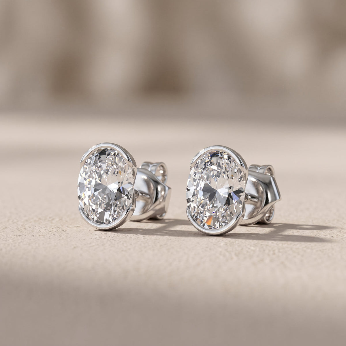 White Metal Oval Cut Moissanite Stud Earrings