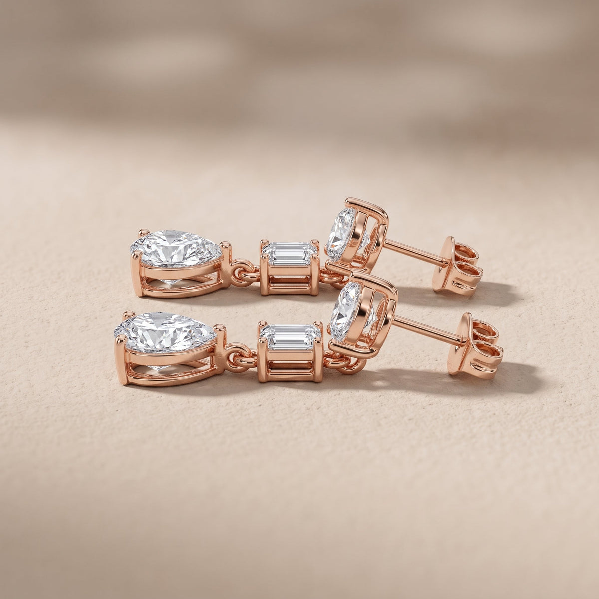 Rose Gold Pear & Emerald Cut Moissanite Drop Earrings