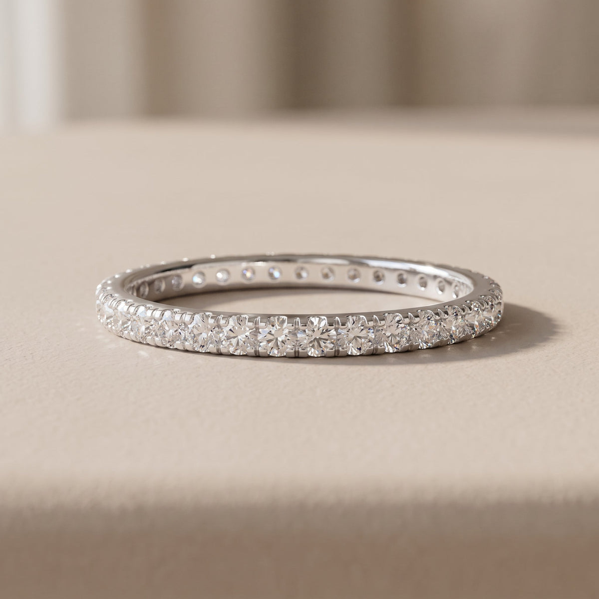 White Metal Round Moissanite Eternity Band Ring