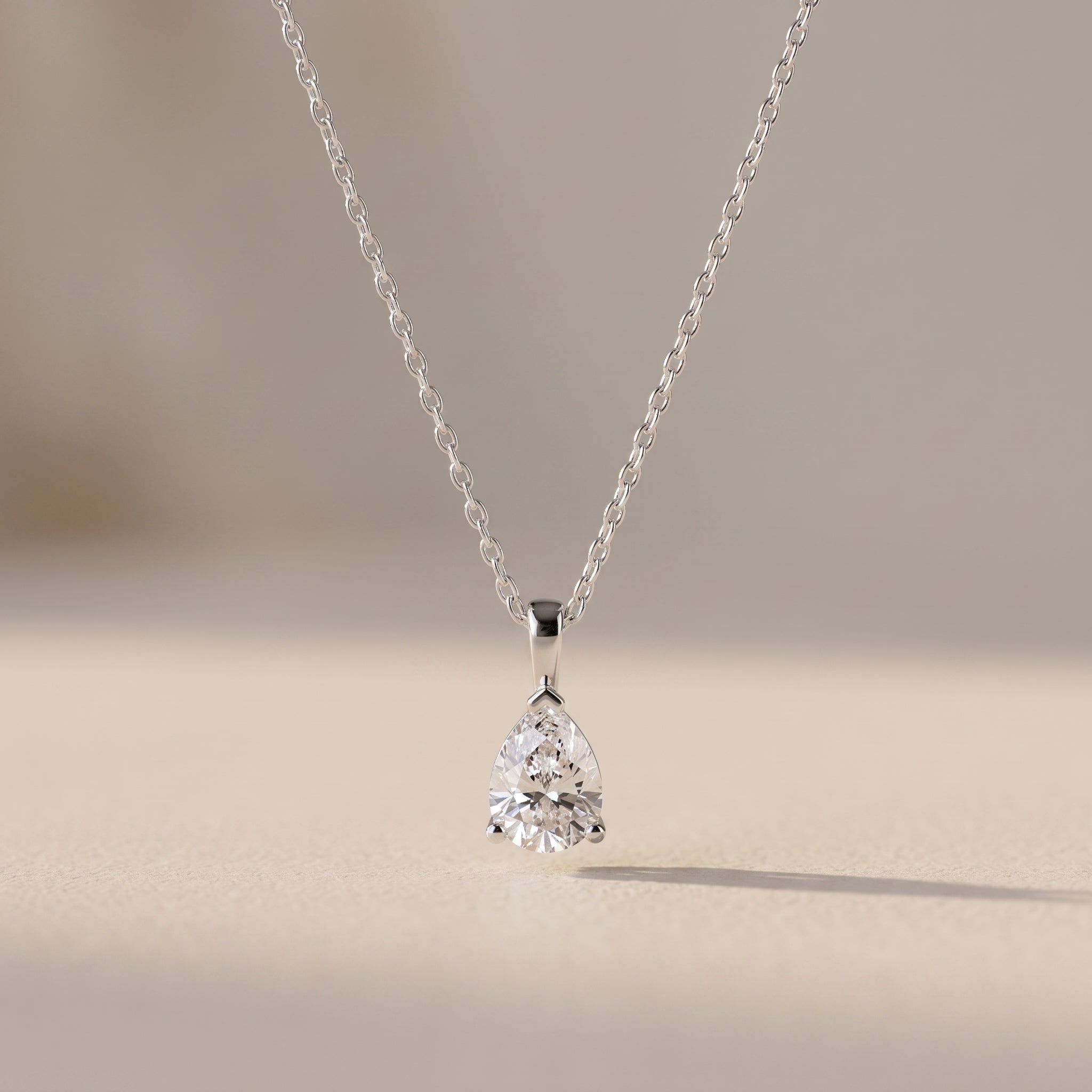 White Metal Pear Cut Moissanite Pendant Necklace