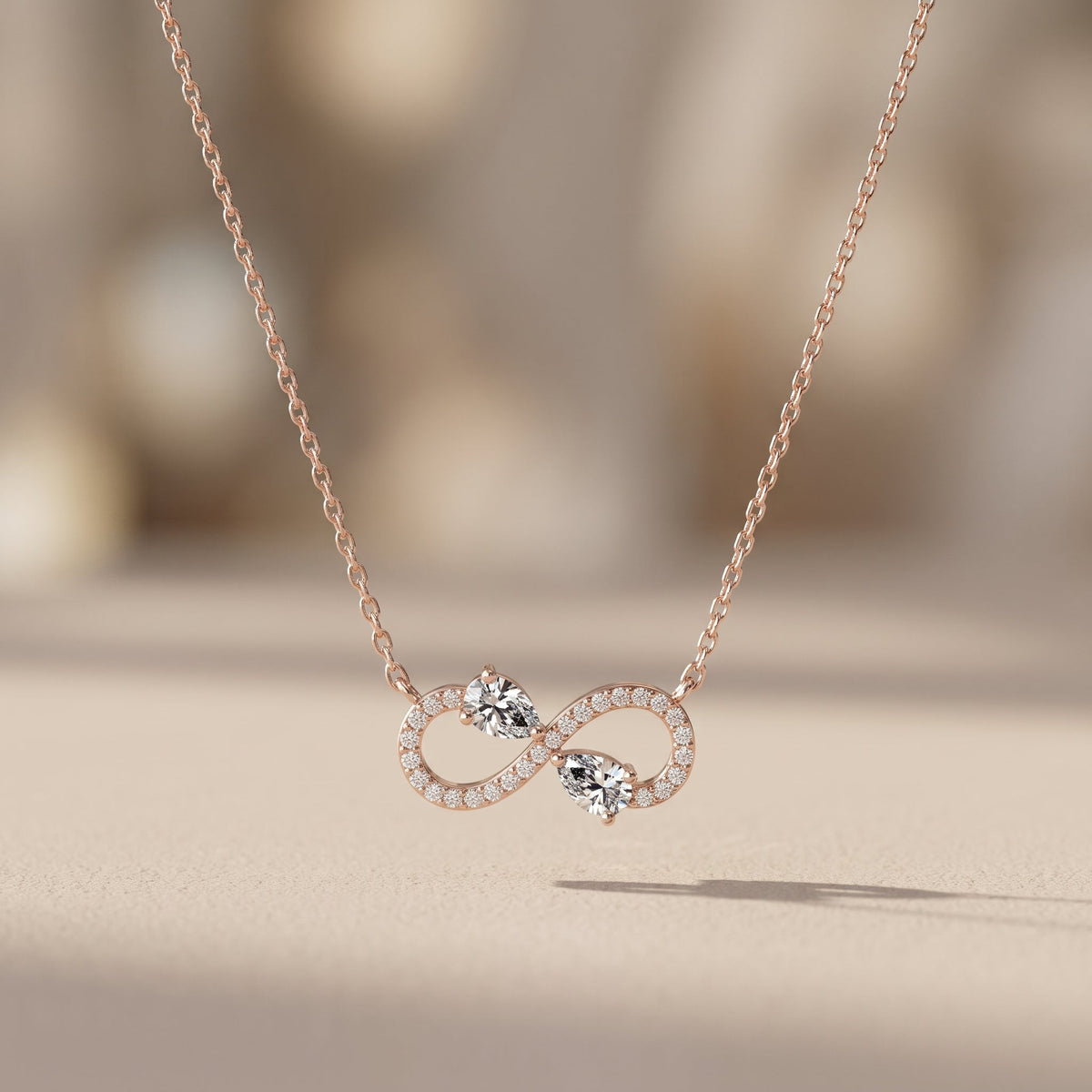 Rose Gold Pear Cut Moissanite Infinity Pendant Necklace