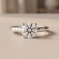 White Metal Round Cut Moissanite Solitaire Ring