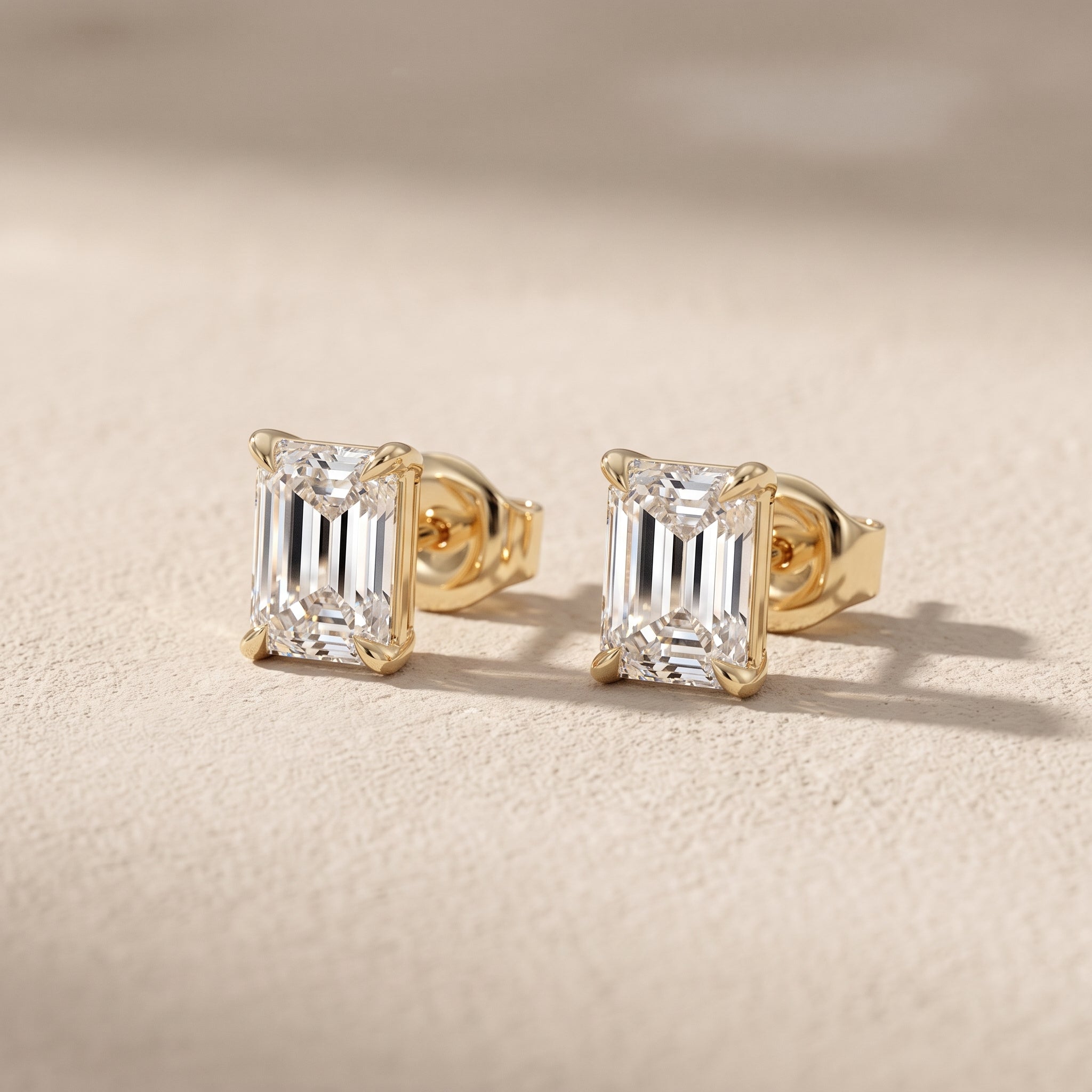 Yellow Gold Emerald Cut Moissanite Stud Earrings