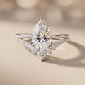 White Pear Cut Moissanite Engagement Ring with Accent Stones