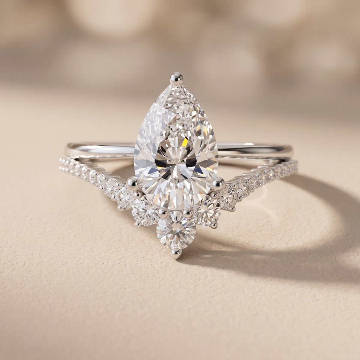 White Pear Cut Moissanite Engagement Ring with Accent Stones