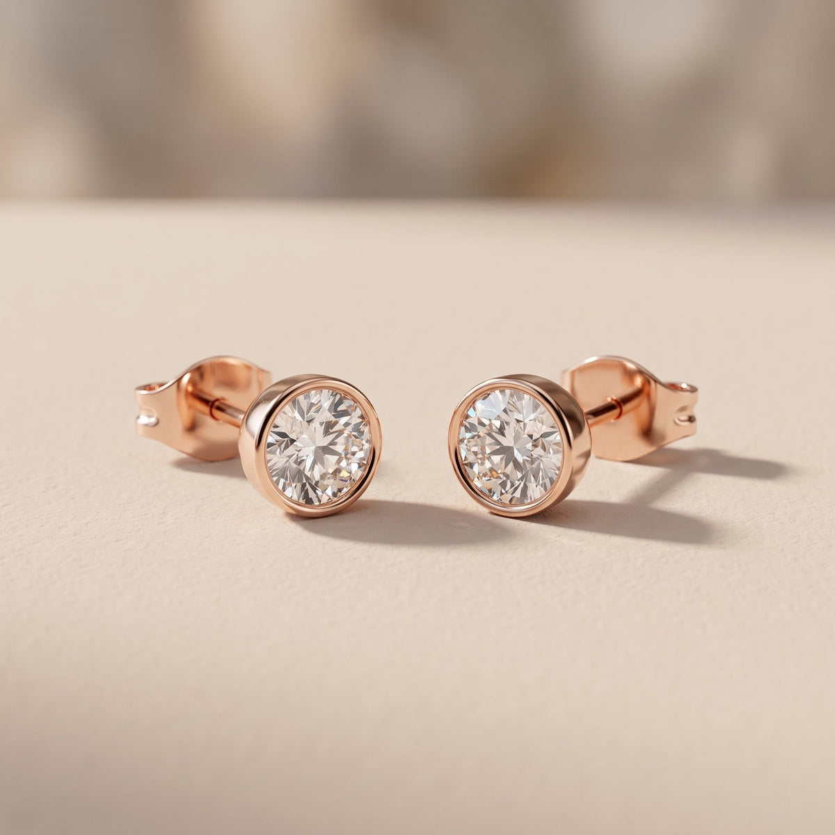 Rose Gold Round Moissanite Bezel Stud Earrings