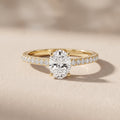 Yellow Gold Oval Cut Moissanite Engagement Ring with Pavé Band