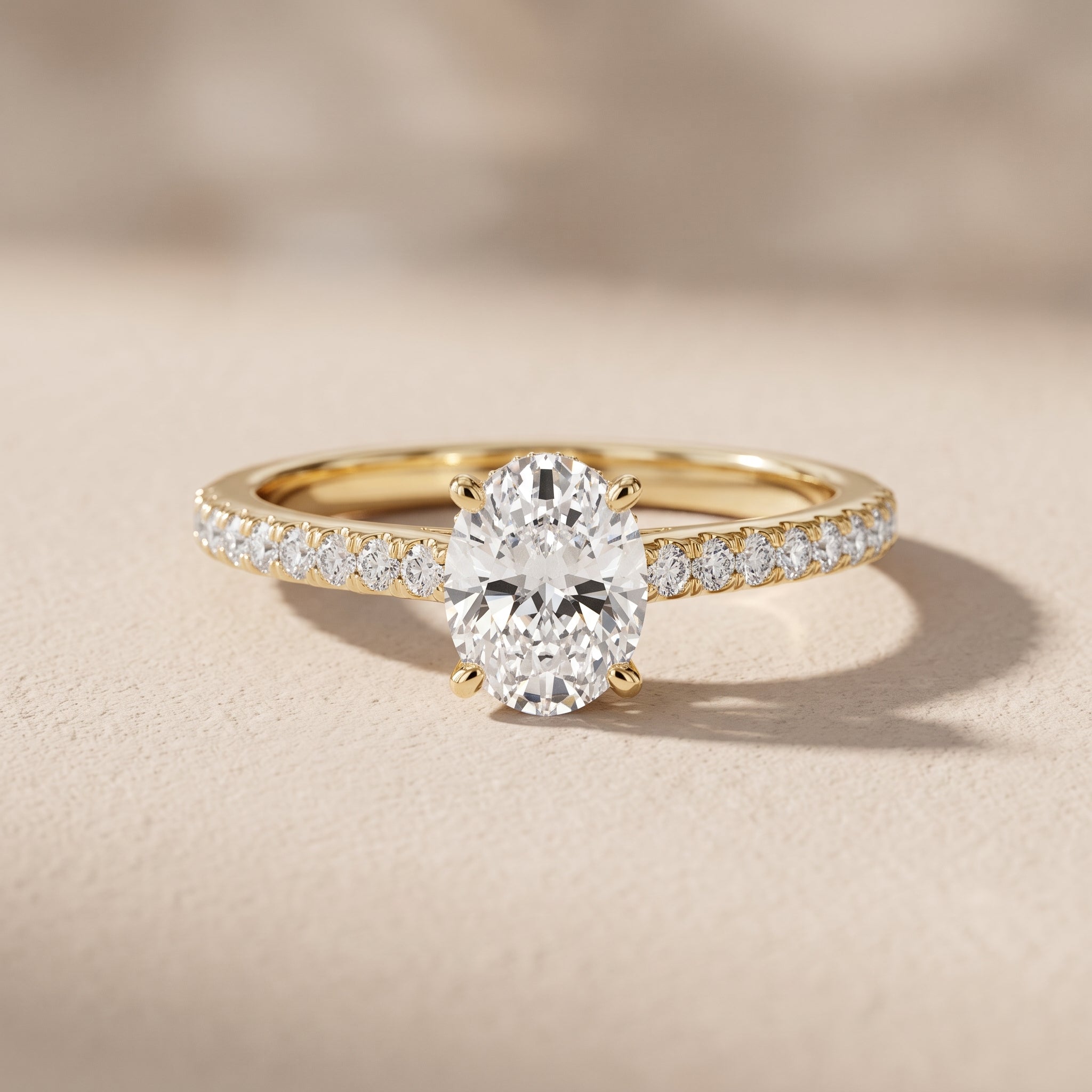 Yellow Gold Oval Cut Moissanite Engagement Ring with Pavé Band