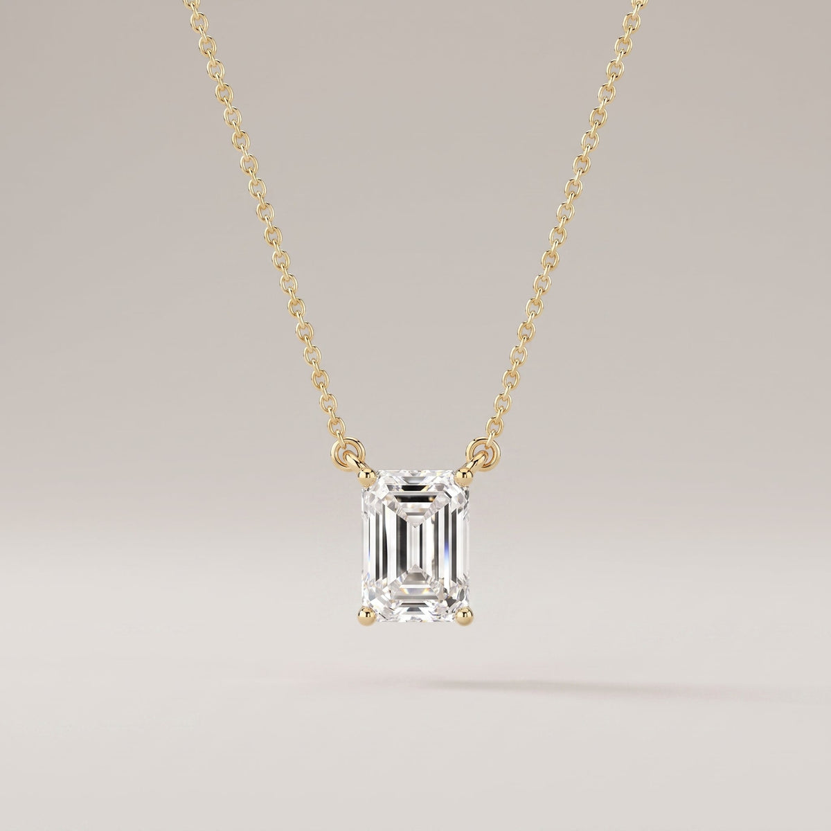 Yellow Gold Emerald Cut Moissanite Solitaire Pendant Necklace