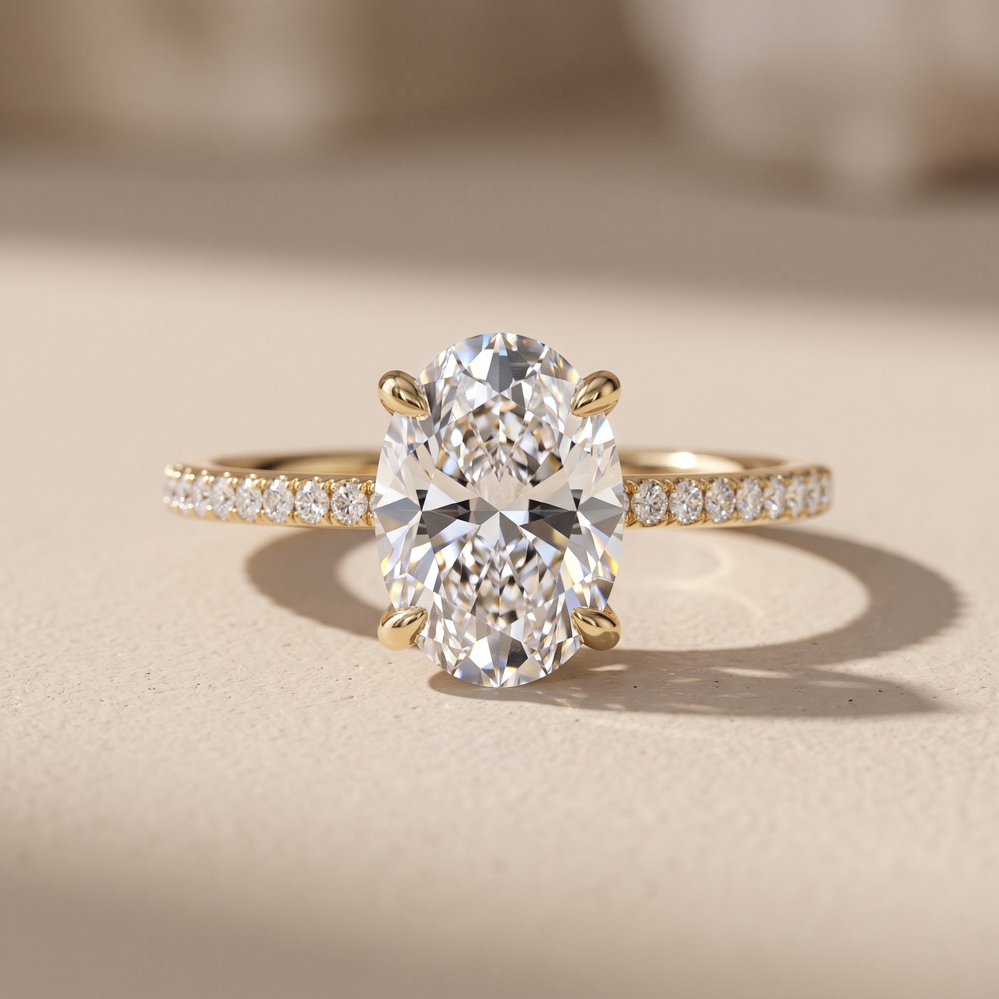 Yellow Gold Oval Moissanite Engagement Ring with Pavé Band