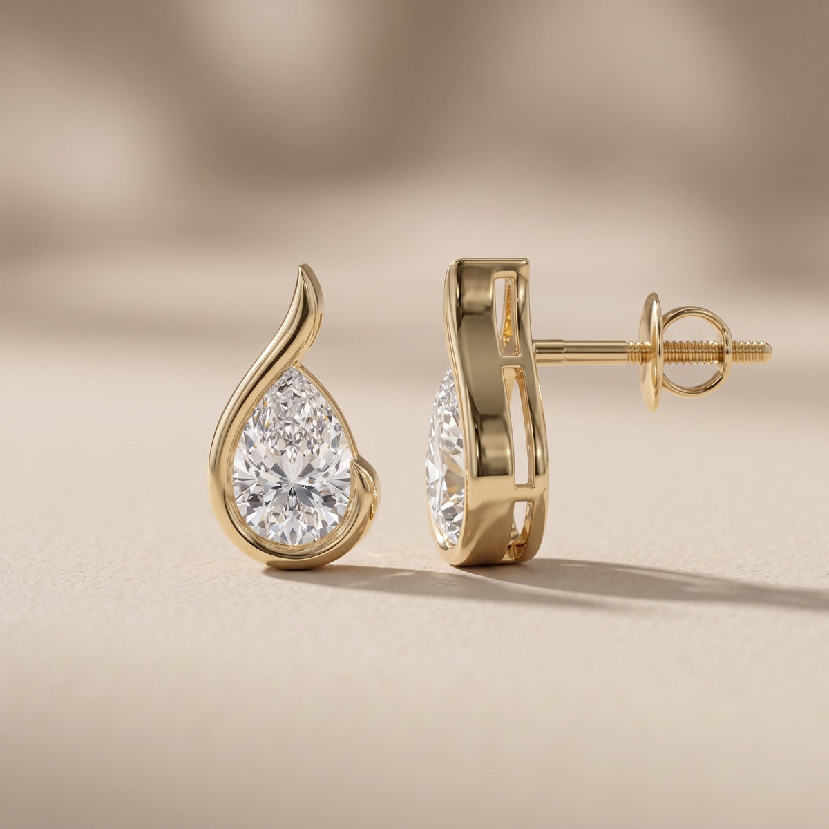 Yellow Gold Pear Cut Moissanite Stud Earrings