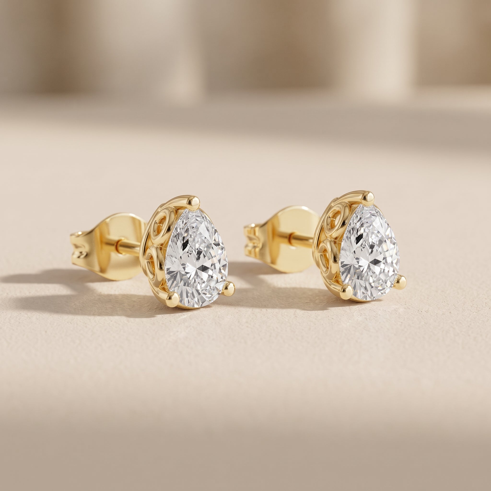 Yellow Pear Cut Moissanite Stud Earrings