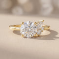 Yellow Gold Round Moissanite Engagement Ring with Side Accents