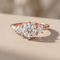 Rose Gold Round Moissanite Three Stone Engagement Ring