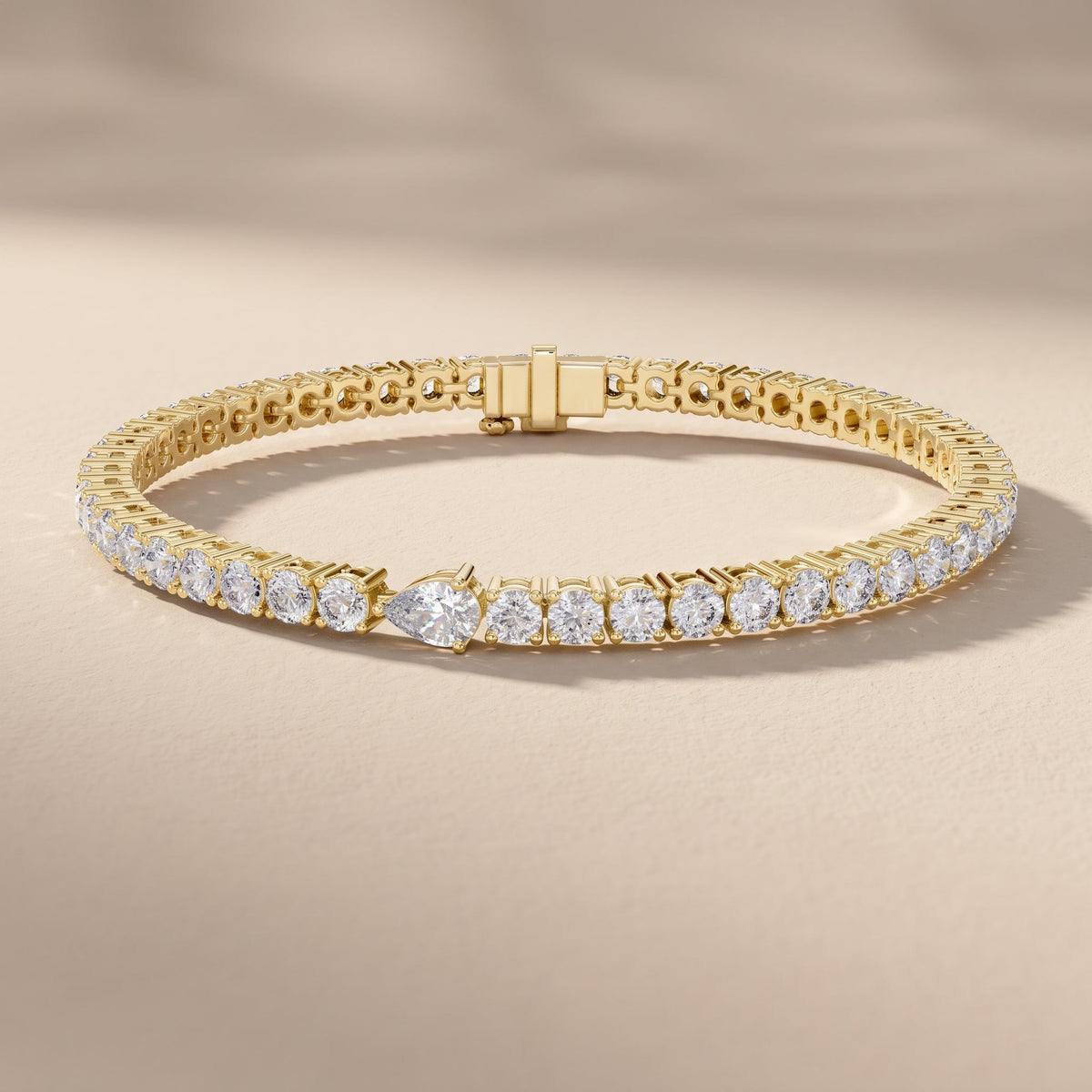Yellow Gold Pear & Round Moissanite Tennis Bracelet