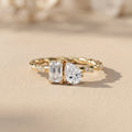 Yellow Gold Emerald & Pear Cut Moissanite Twist Ring