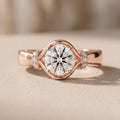 Rose Gold Oval Moissanite Engagement Ring with Accent Stones