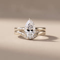 White Metal Pear Cut Moissanite Engagement Ring Set