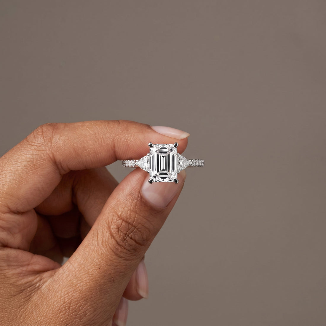 White Metal Emerald Cut Three-Stone Engagement Ring