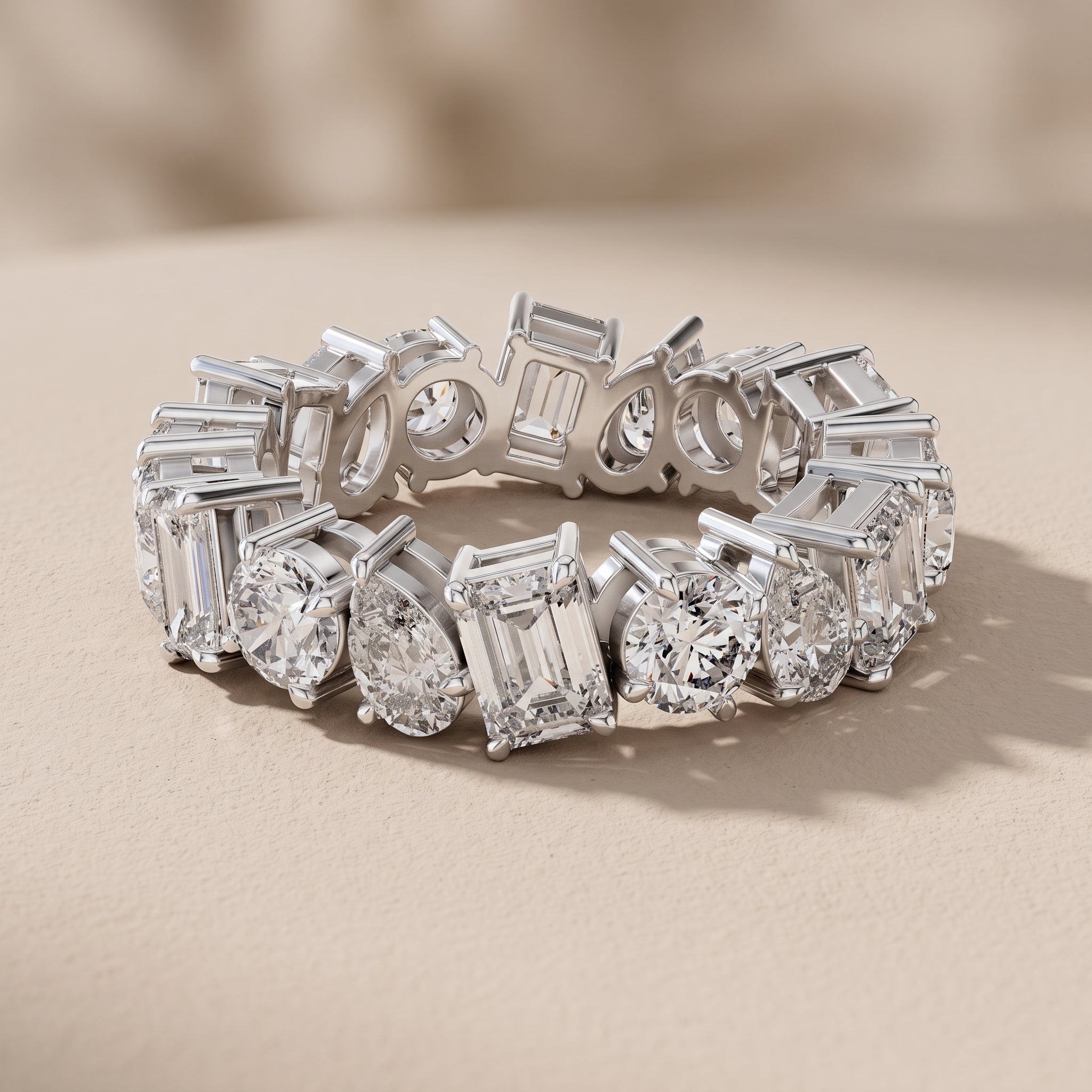 White Metal Alternating Emerald, Pear & Round Moissanite Eternity Band Ring