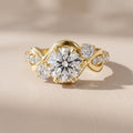 Yellow Gold Round Moissanite Twisted Three Stone Engagement Ring