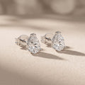 White Pear Cut Moissanite Stud Earrings