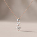 Rose Gold Round Moissanite Three Stone Drop Pendant Necklace