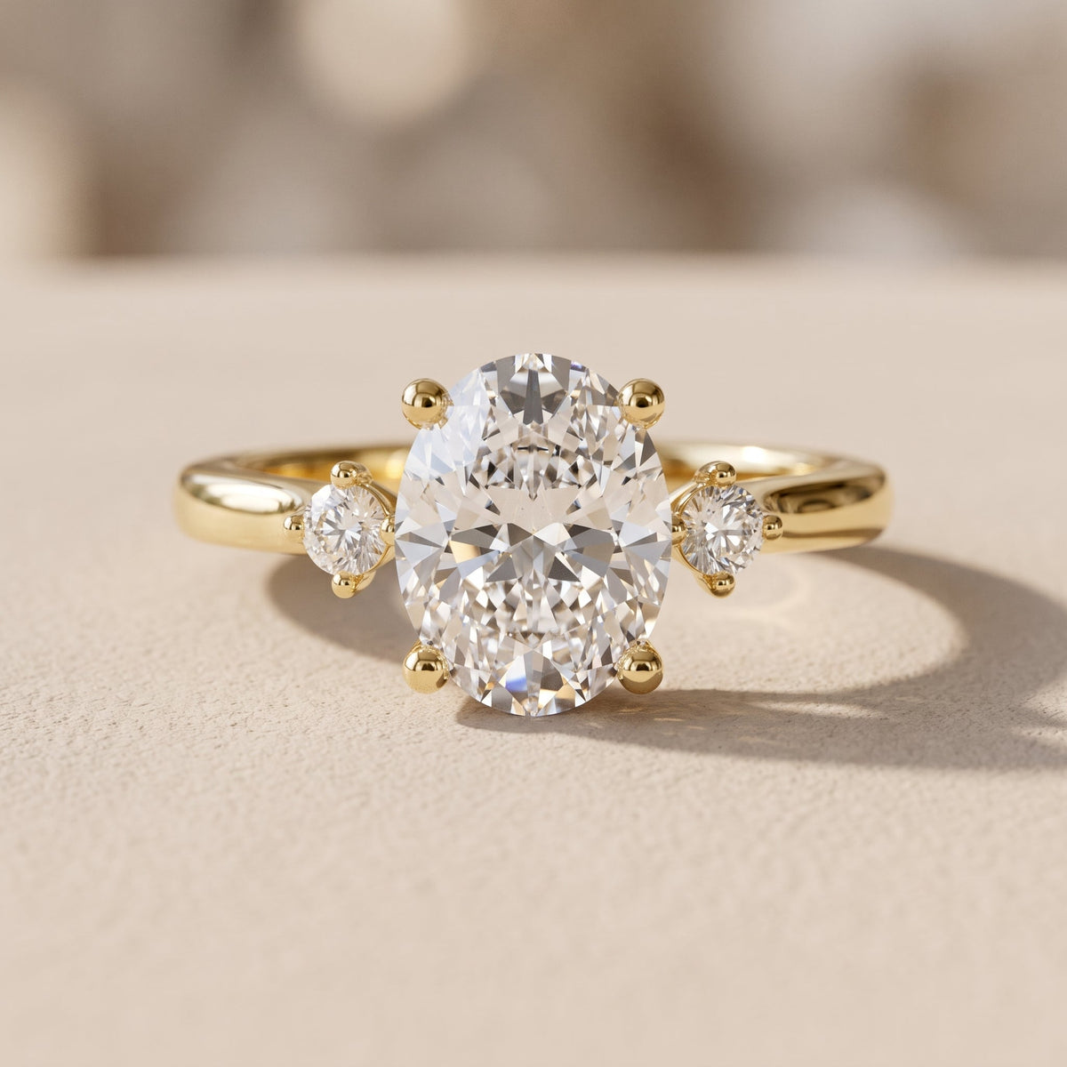 Yellow Gold Oval Moissanite Three Stone Engagement Ring
