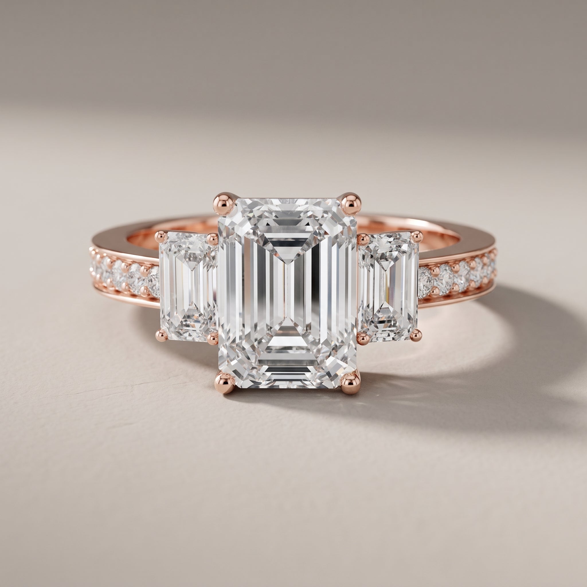 Rose Gold Emerald Cut Moissanite Three Stone Engagement Ring