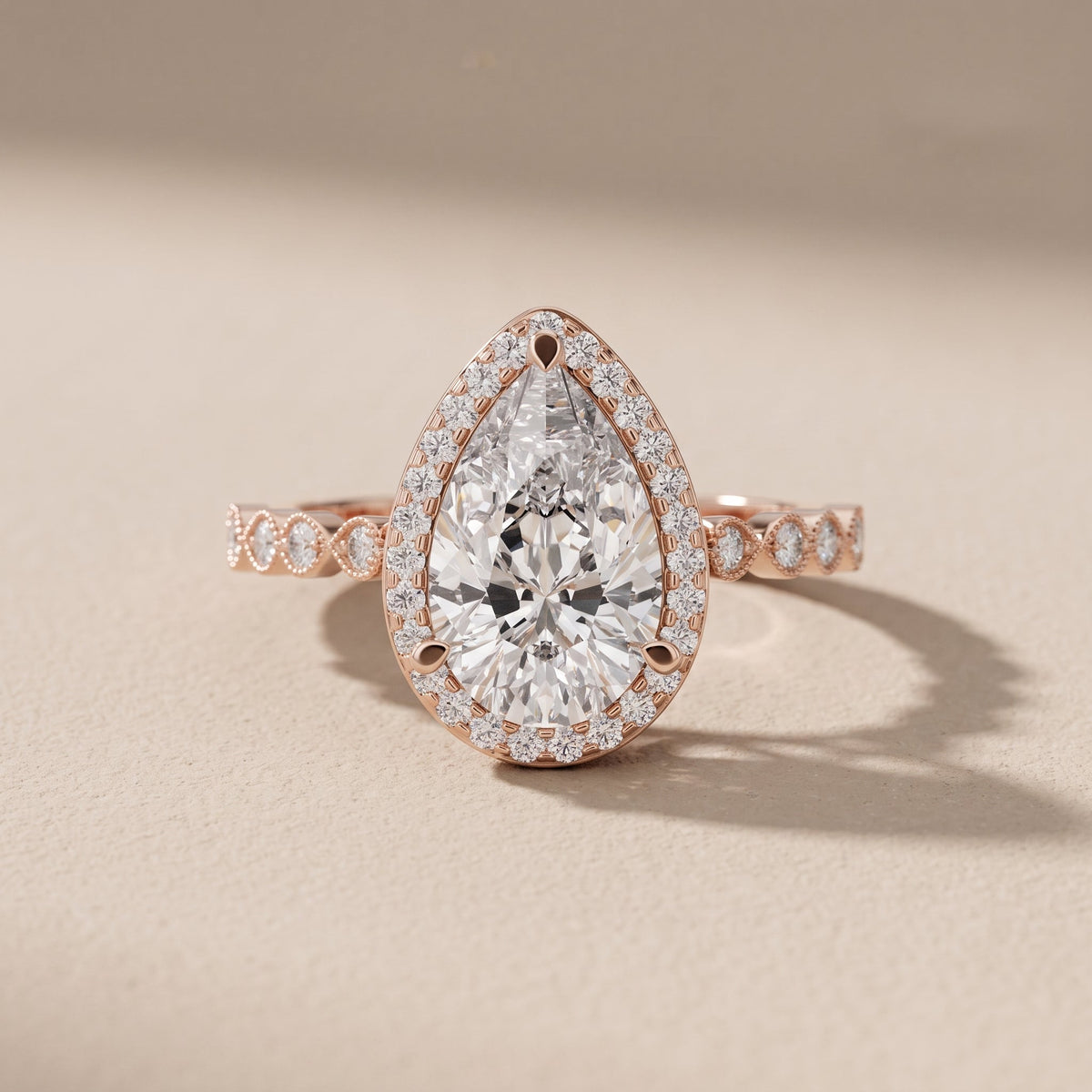 Rose Gold Pear Cut Moissanite Halo Engagement Ring
