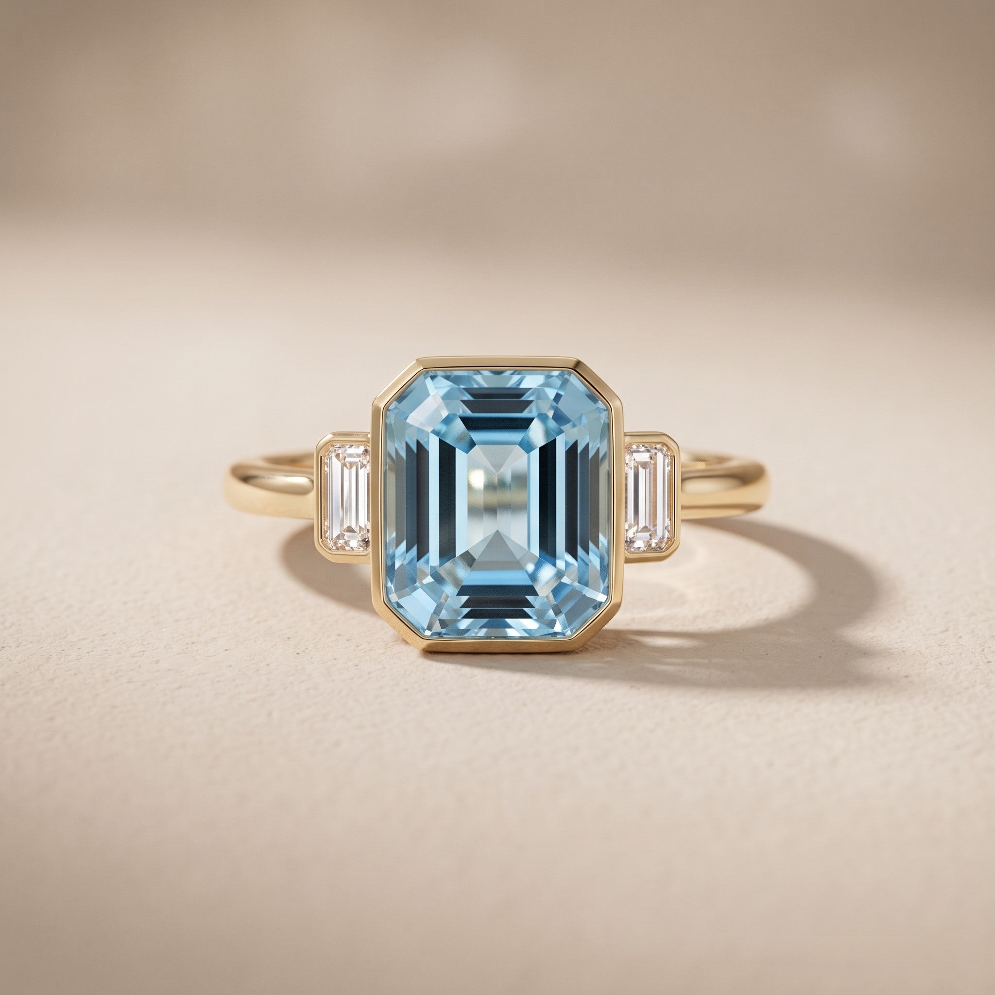 Yellow Gold Emerald Cut Blue Moissanite Three-Stone Ring