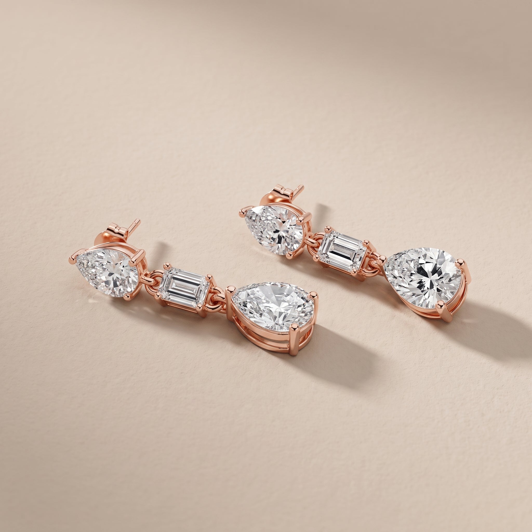 Rose Gold Pear & Emerald Cut Moissanite Drop Earrings
