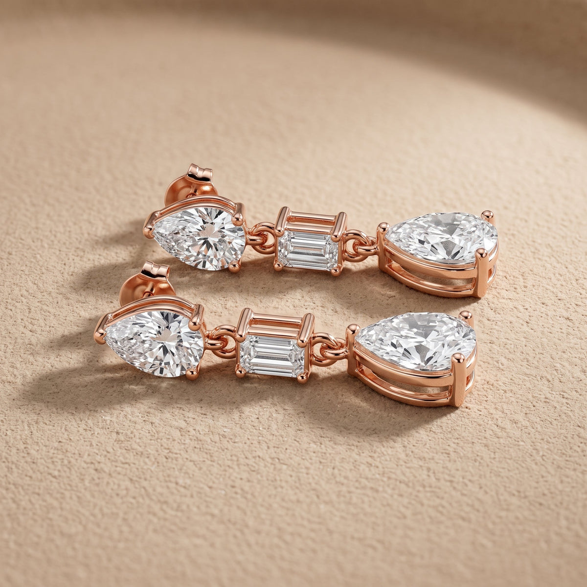 Rose Gold Pear & Emerald Cut Moissanite Drop Earrings