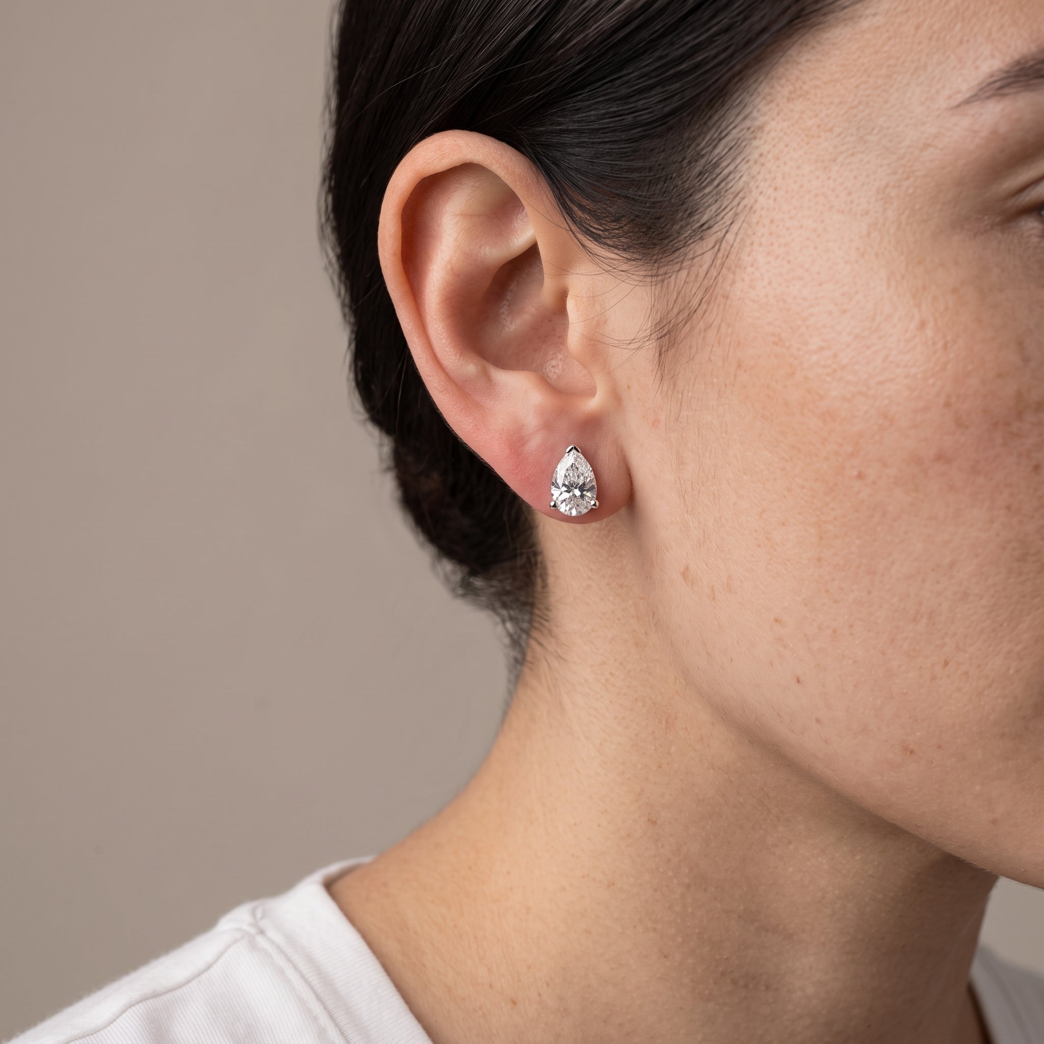White Pear Cut Moissanite Stud Earrings