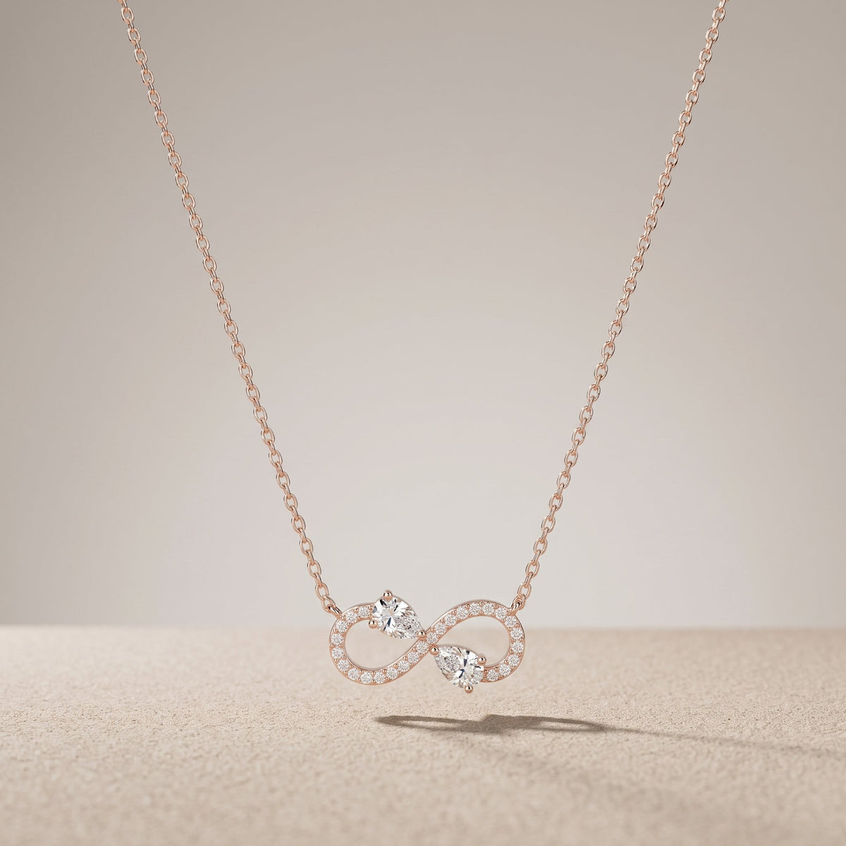 Rose Gold Pear Cut Moissanite Infinity Pendant Necklace
