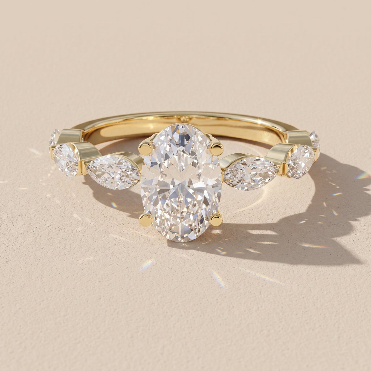 Yellow Gold Oval Moissanite Engagement Ring with Marquise Accents